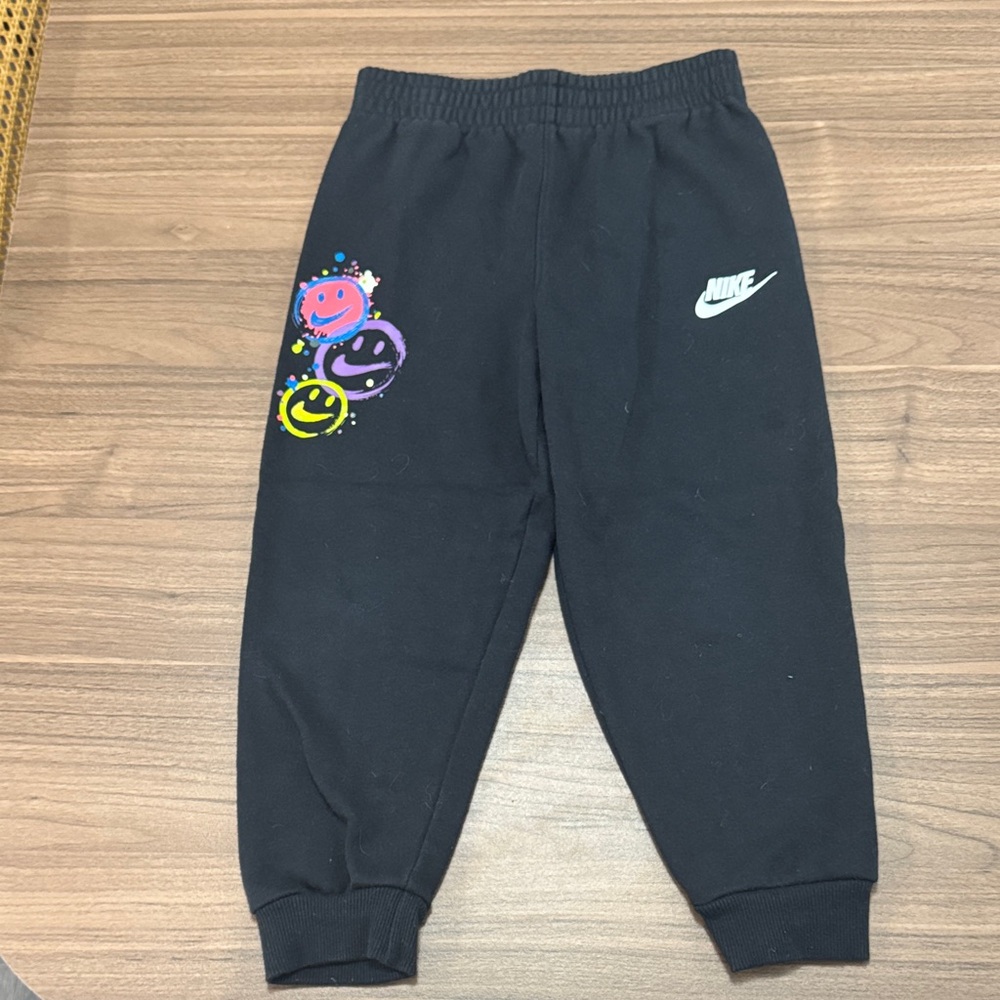 Nike Kids Black Joggers with Colorful Smiley Design